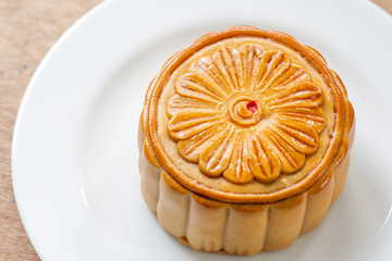 Moon Cake close up on old wood table , Chinese Culture