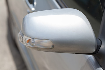 Car mirror with turn signal