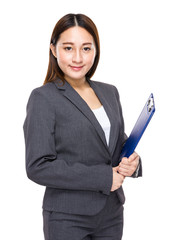 Businesswoman with clipboard