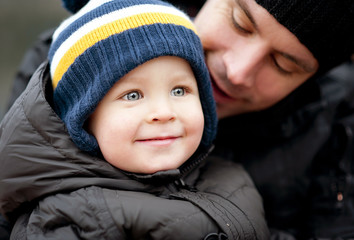 Father and sonin winter