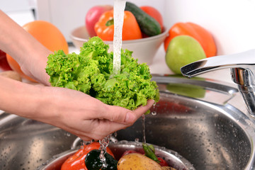 Washing fruits and vegetables close-up