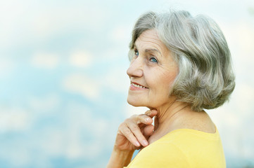 Old woman enjoying a walk