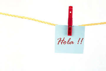 Note colored paper with the word hola © Eduardo Lopez