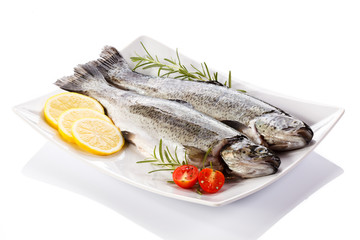 Fresh raw trout on white background