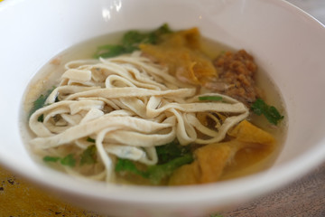 Thai fish noodle with clear soup.