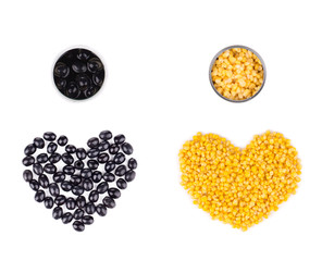 Two hearts form olives and corn.