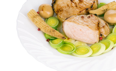 Warm meat salad with vegetables.