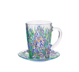 Glass cup with painted floral ornament.