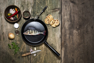 perch fish on the cast iron pan