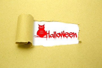 Halloween text on brown paper with white background