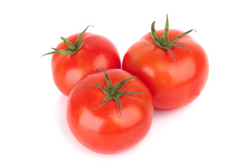 Tomato with drops isolated on white background
