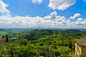 Fototapeta na wymiar House with a view of Tuscany landscape near San Gimignano