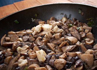 Delicious fried mushrooms in pan