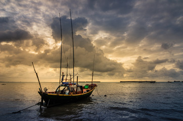 Fototapeta premium Fishing sea boat and Sunrise