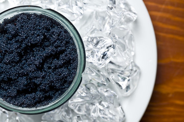 black caviar in jar