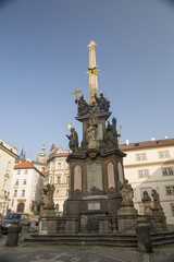 Obraz premium column with sculptures in Prague