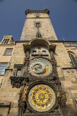 old clock on wall of tower in Prague