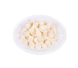 Tofu cheese on white plate.