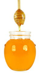 dripping honey in a bowl