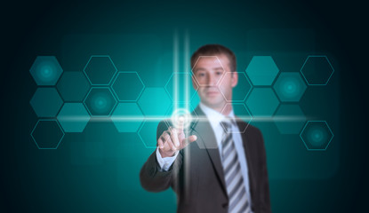 Businessman in suit finger presses virtual button