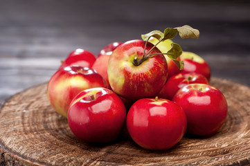 Red apples on textured background