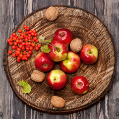 Red apples on textured background.