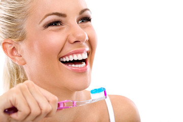 young woman holding a tooth-brush