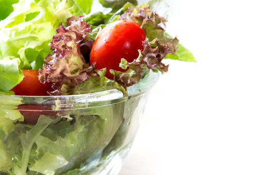 close up glass bowl of fresh vegetable salad