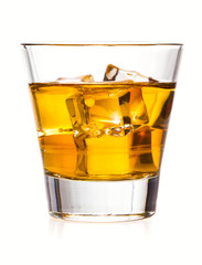 Glass of whiskey with ice, isolated on white background