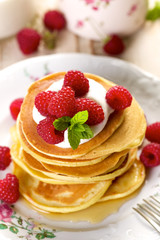 Pancakes with fresh raspberries and cream cheese