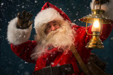 Santa Claus holding sack with gifts