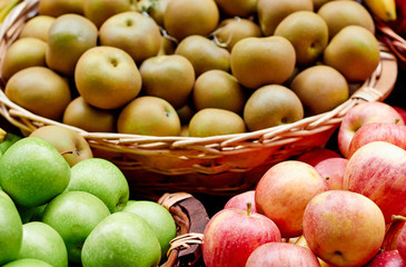 Apples and pears at the market in the season