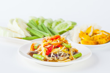 Papaya salad (som tum Thai) with sticky rice and grilled chicken