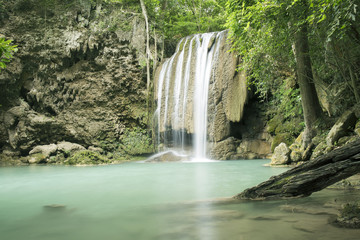 Fototapeta na wymiar Erawan Waterfall in the deep forest