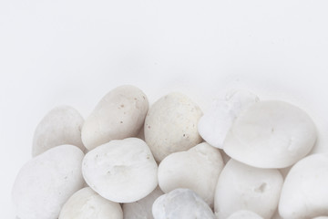 White stone on white paper background