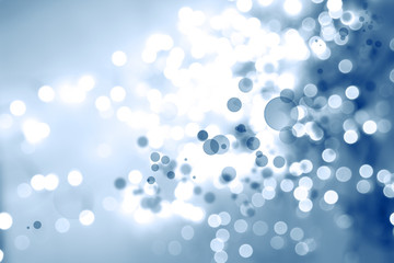 Abstract blue and white bokeh blurs background