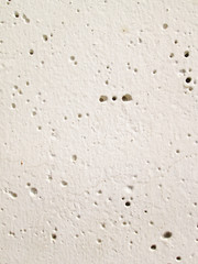 white wall with a hole background