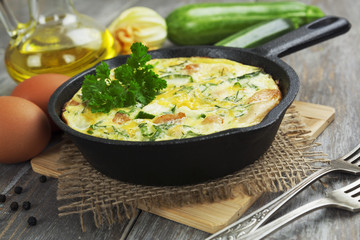 Baked zucchini with chicken and herbs