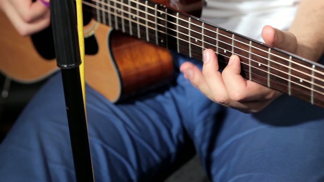 Guitar playing close up footage