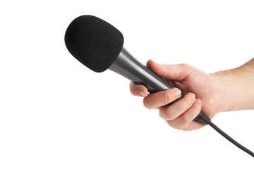 Person hand holding microphone