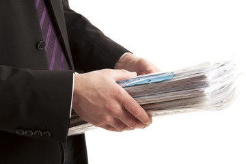 Person holding stack of paper