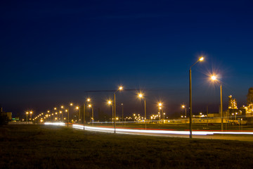 Road near the factory at night.
