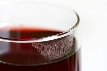 Lipstick on a glass of wine closeup