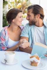 Happy couple enjoying coffee together