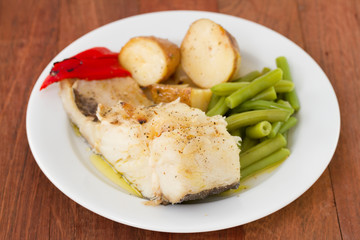 fish with vegetables on plate