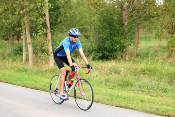 Obraz premium male cyclist on a race bike