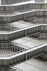 Modern fire escape ladder of gray color