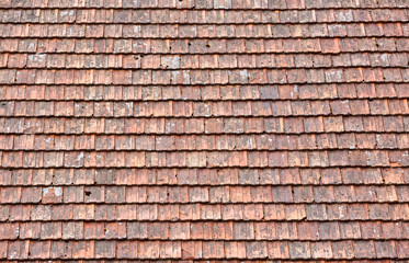 Old red roof tiles background