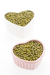 Green mung beans isolated on white background