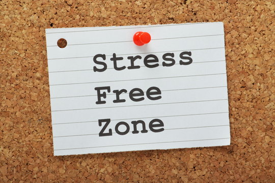 The phrase Stress Free Zone on a cork notice board